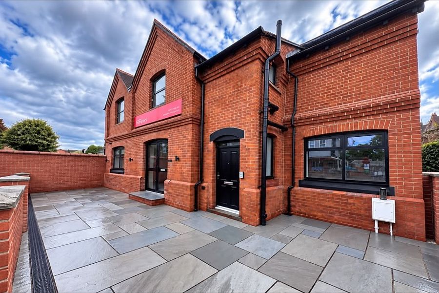 Red brick house with clean brickwork after DOFF cleaning by Eco Dry Ice Blasting