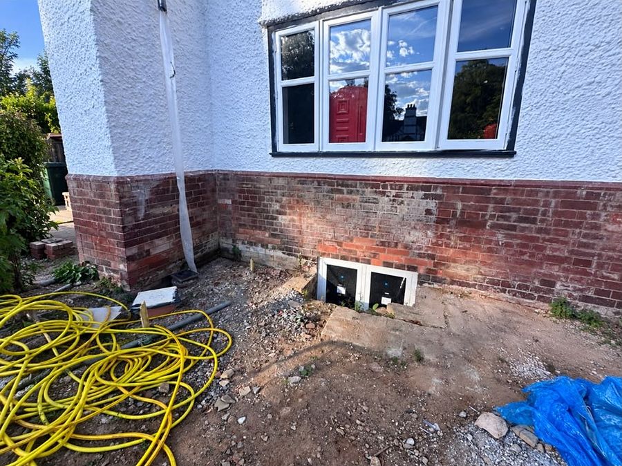 Stained brickwork below a window before DOFF cleaning