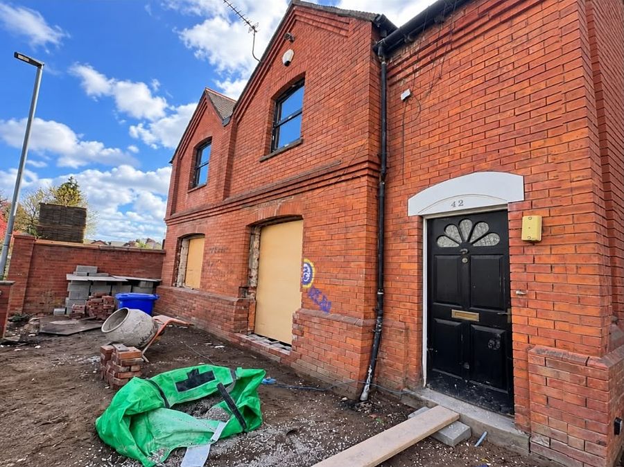 Exterior brickwork of a period property being prepared for DOFF cleaning